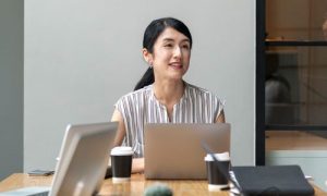 woman in front of computer