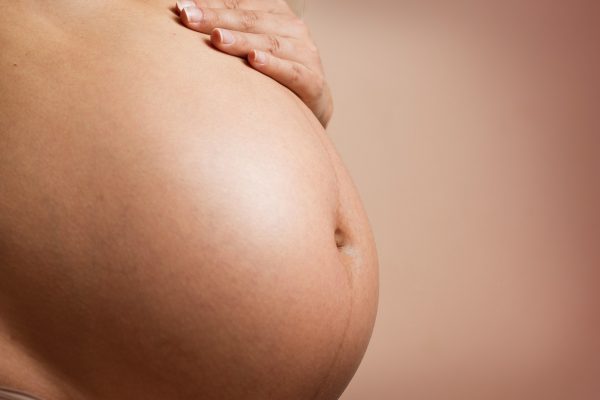person-s-tummy-and-hand-1556671 Childbirth Educator Certification
